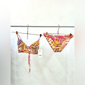 Medium Maaji women’s reversible bikini top and bottom.